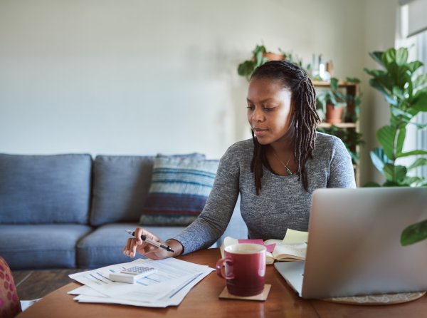 Woman Working Out Tax