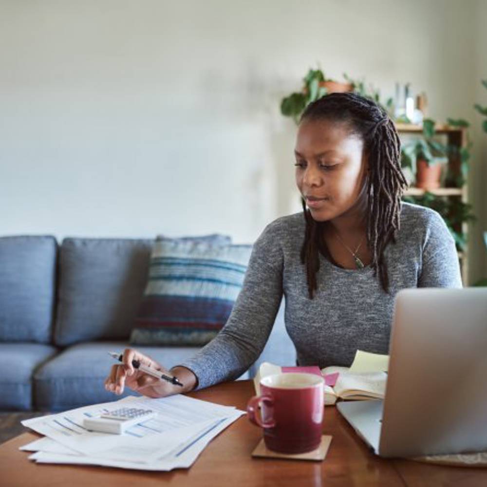 Woman Working Out Tax